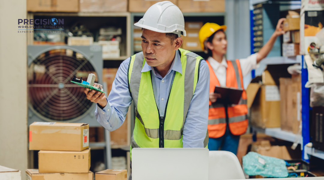 Warehouse worker documenting product damage with a quality control station, using WMS for inspection and tracking